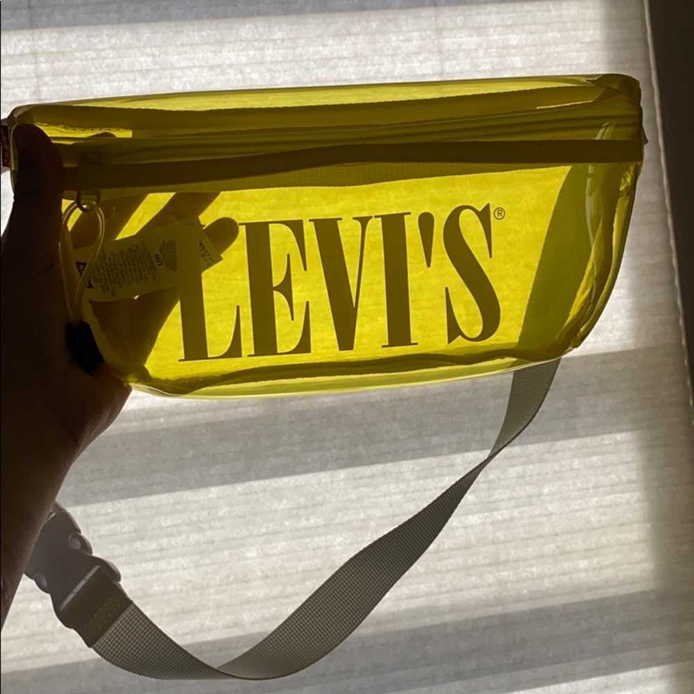 A clear-yellow satchel , Fanny pack